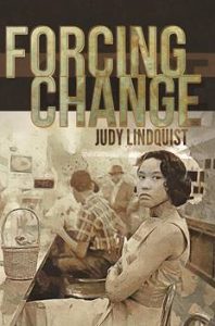 Cover art for Forcing Change show young black woman sitting at a counter in a diner. Photo is old-fashioned and sepia-toned.