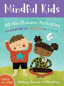 Cover of Mindful Kids shows a boy standing and a girl sitting.