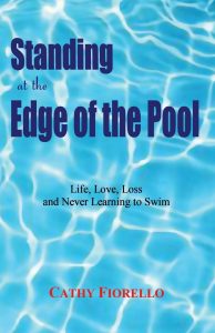 Cover of Standing at the Edge of the Pool is a photo of a pool's surface reflecting the light.
