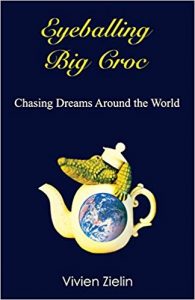 Cover of Eyeballing Big Croc shows a crocodile coming out of a teapot with the world centered on the teapot.